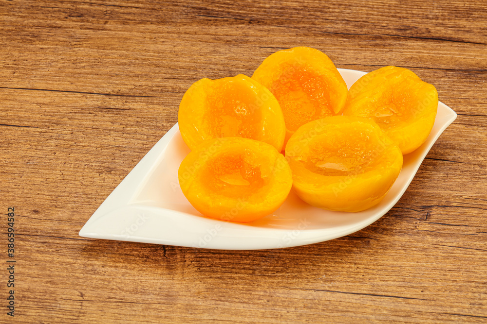 Marinated peaches fruit in the bowl