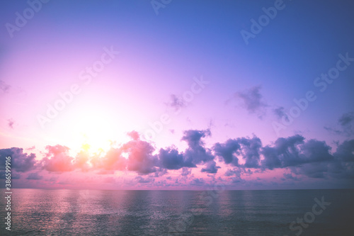 Sunset over the sea. Colorful cloudy sky at sunset. Gradient color. Sky texture. Abstract nature background © vvvita