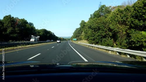 Boston Massachusetts USA   Cars driving on the Massachusetts Turnpike.  