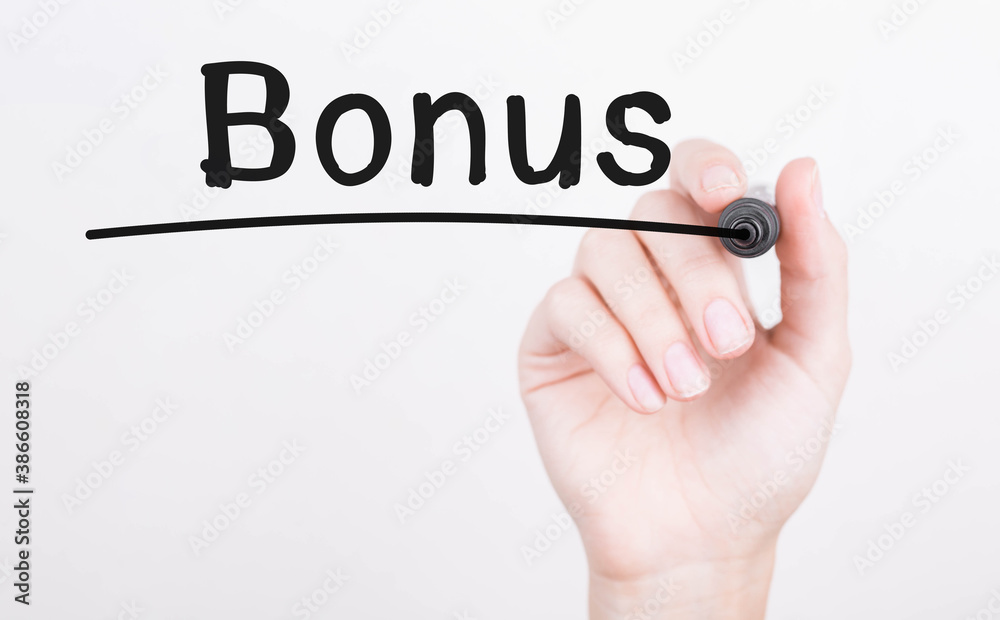 Hand writing Bonus with black marker on transparent wipe board Hand writing Bonus with black marker on transparent wipe board