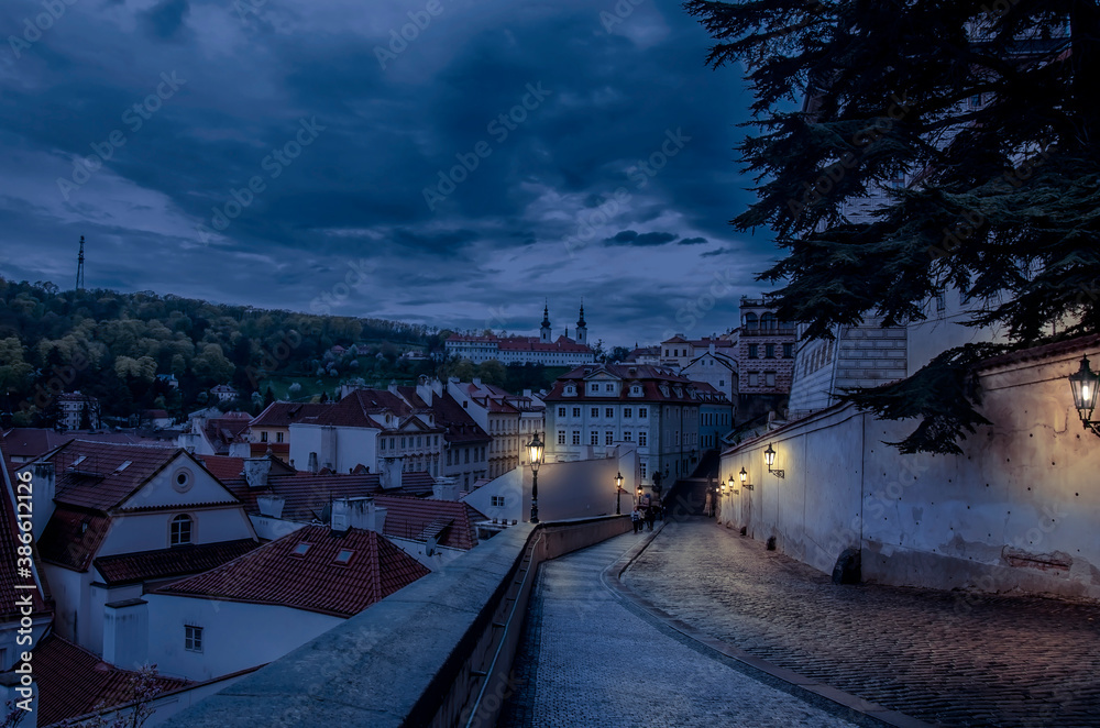 View of street at night in Prague, Czech Republic. Street with beautiful view on historic city center in Prague.