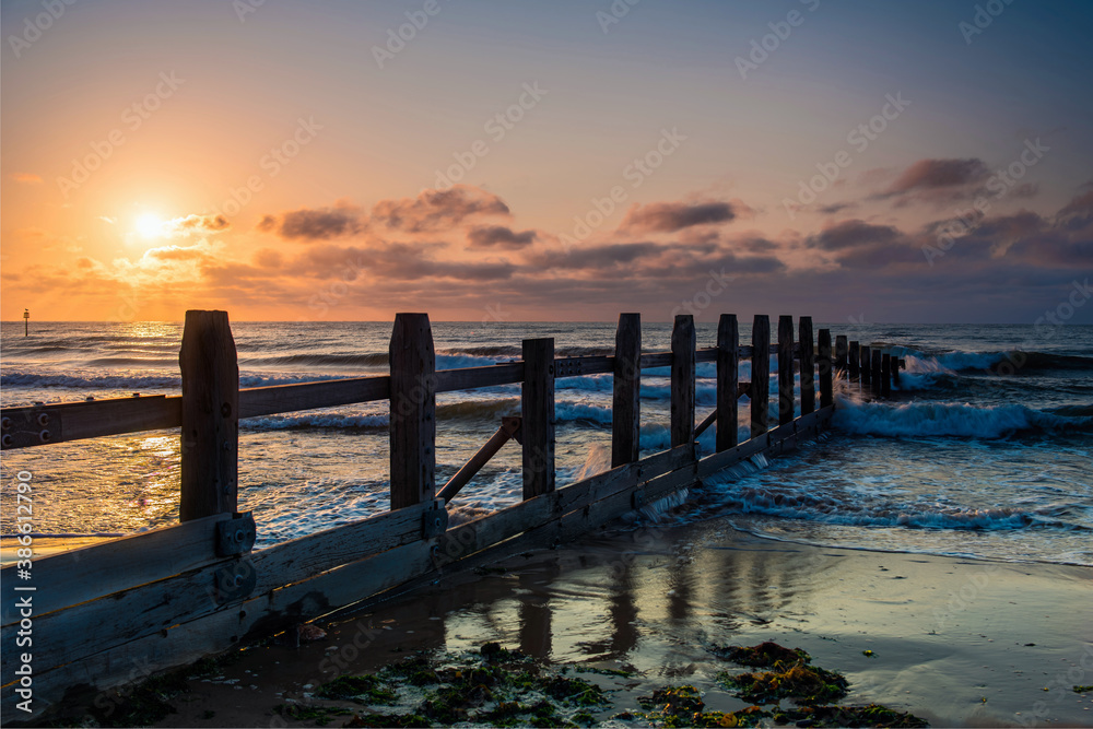 Sunrise on the beach at Dawlish Warren in Devon in England in Europe.