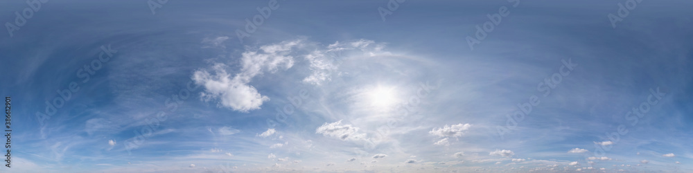 Seamless cloudy blue sky hdri panorama 360 degrees angle view with beautiful clouds  with zenith for use in 3d graphics or game as sky dome or edit drone shot