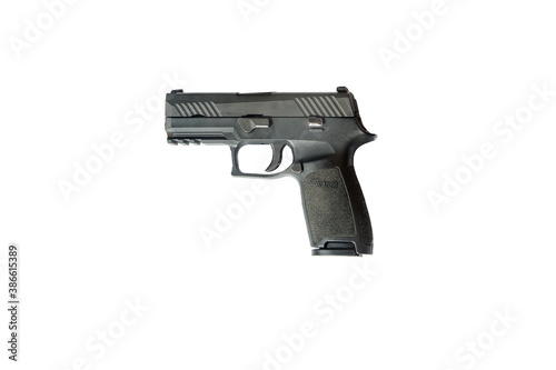 A compact pistol on a white background photo