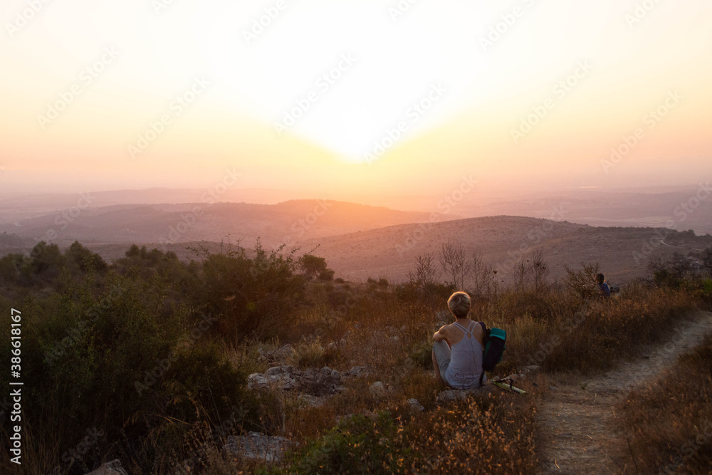 People watching sunset at the Mountain of Winds, Ein Nataf, Jerusalem area.