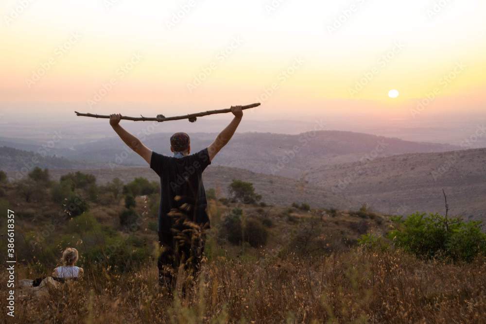 People watching sunset at the Mountain of Winds, Ein Nataf, Jerusalem area. People watching sunset at the Mountain of Winds, Ein Nataf, Jerusalem area.