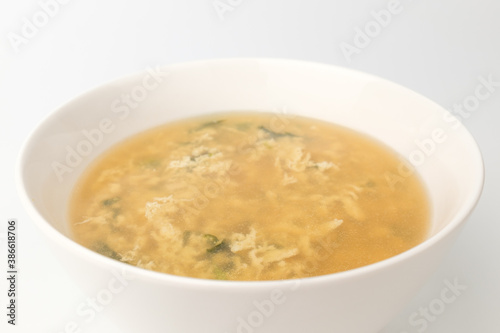 Egg soup on white background