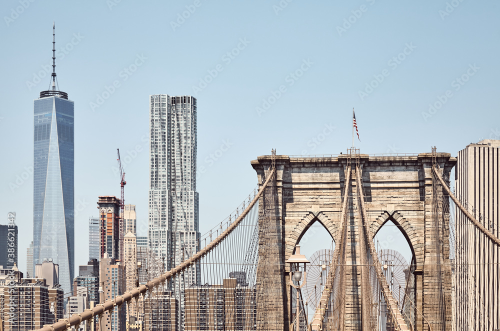 Fototapeta premium Brooklyn Bridge with Manhattan skyline in background, color toning applied, New York City, USA.