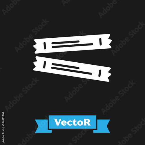 White Sugar stick packets icon isolated on black background. Blank individual package for bulk food products as coffee, salt, spices. Vector.