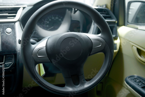 Close up view of car steering wheel