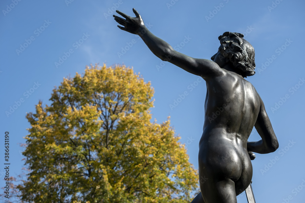 Fototapeta premium David and Goliath sculpture placed in Parc des Bastions in Geneva