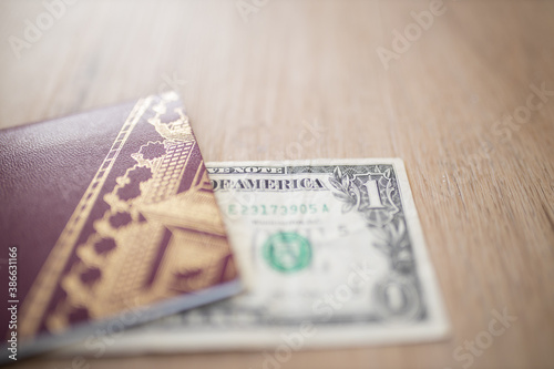 Half a One-Dollar Bill is Hidden Under a Sweden Passport