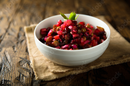 Traditional vinaigrette salad with beetroot photo