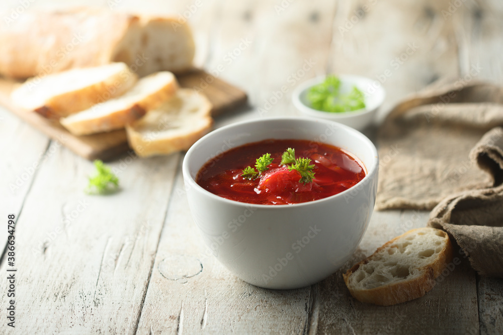 Traditional homemade beetroot soup with fresh parsley