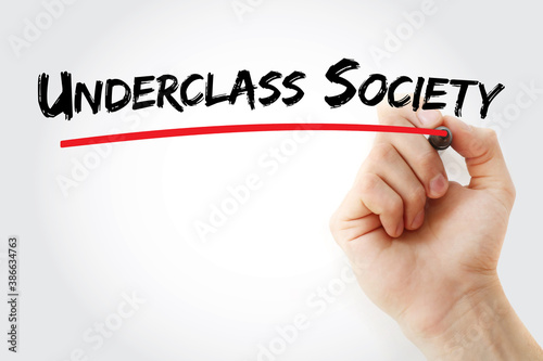 Underclass Society text with marker, concept background