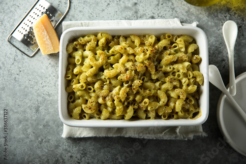 Homemade pasta bake with pesto sauce photo