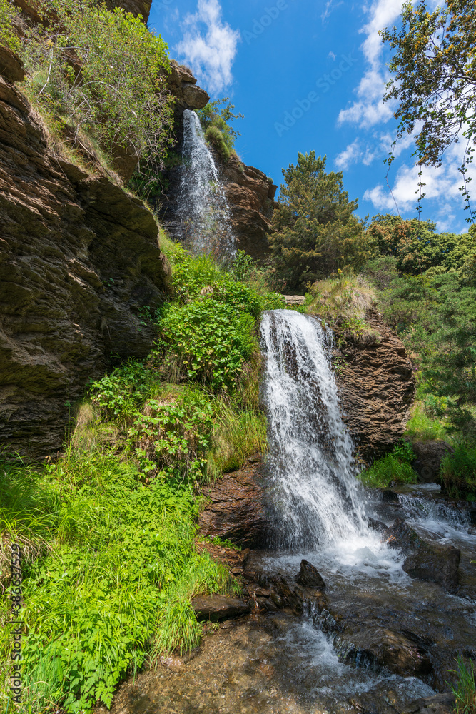 waterfall in a ravine in Sierra Nevada