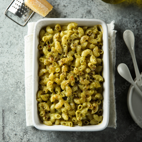 Homemade pasta bake with pesto sauce photo