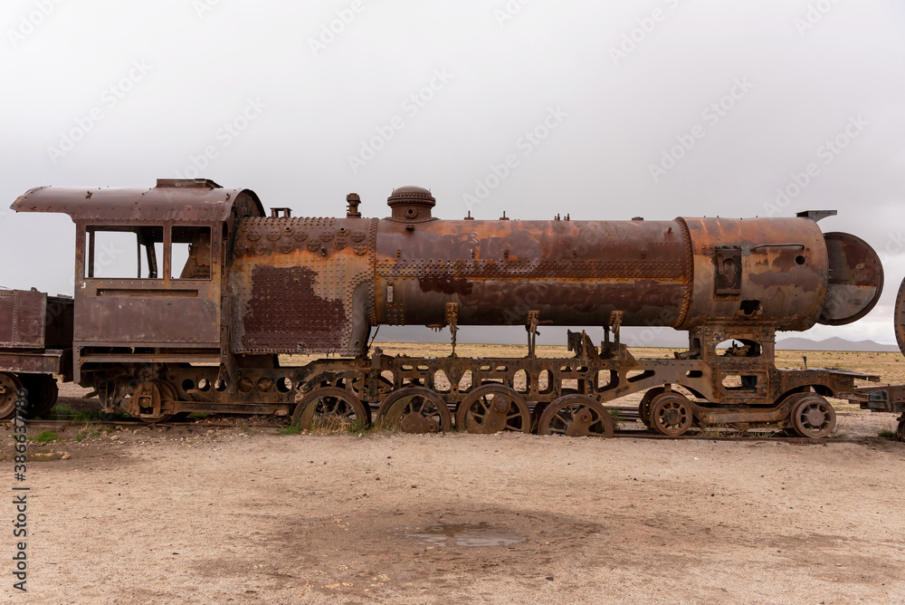 Old rusty locomotive abandoned in a train cemetery. Uyuni, Bolivia