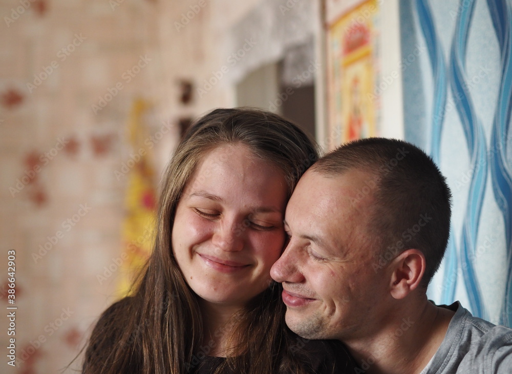 Fototapeta premium Love and affection between a young couple.Lovely conversation and privacy.