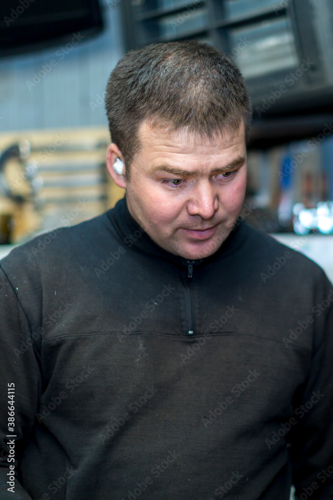 Close-up portrait of a man in the workplace Close-up portrait of a man in the workplace