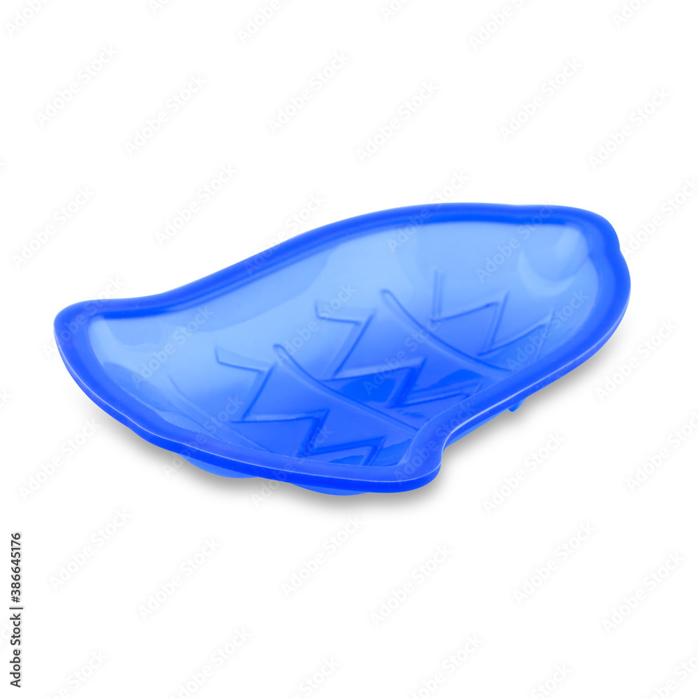 Blue silicone cupcake or muffin form isolated on white background. Cake cup, silicone mold, bakeware. Blue silicone cupcake or muffin form isolated on white background. Cake cup, silicone mold, bakeware.