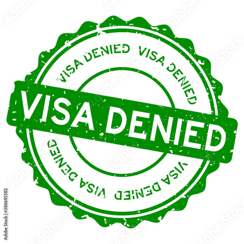 Grunge green visa denied word round rubber seal stamp on white background