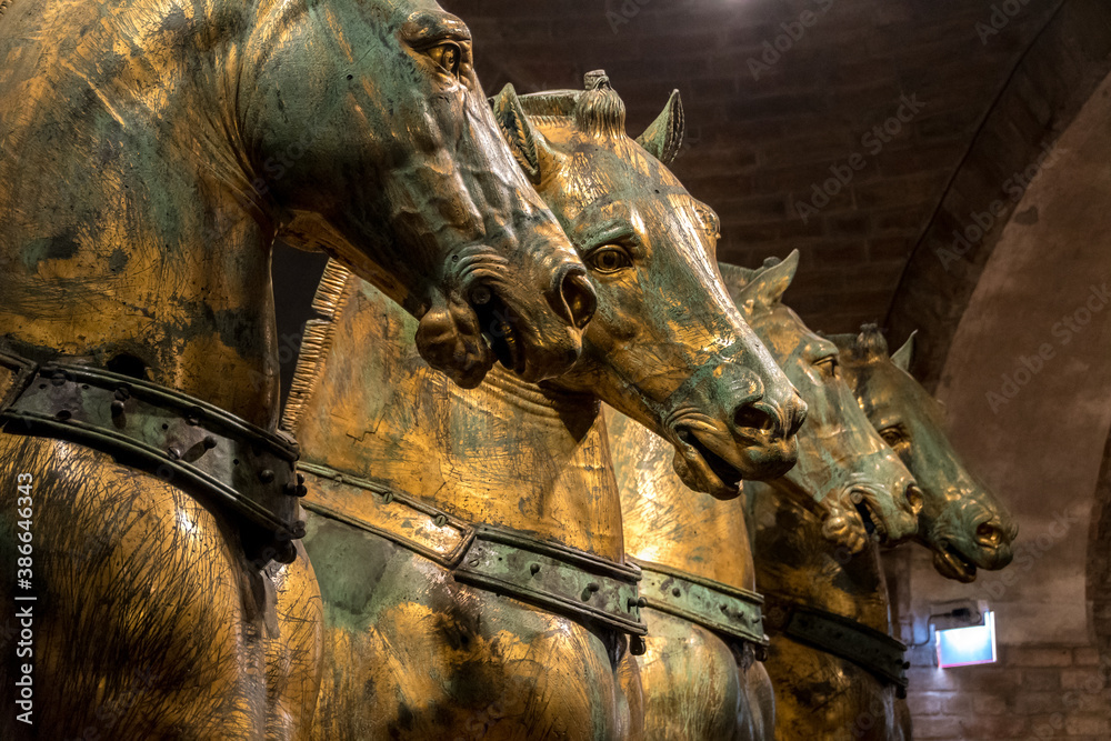 Fototapeta premium Roman quadriga, (four horses), on the roof of San Marco Cathedral in Venice, Venezia, Italy