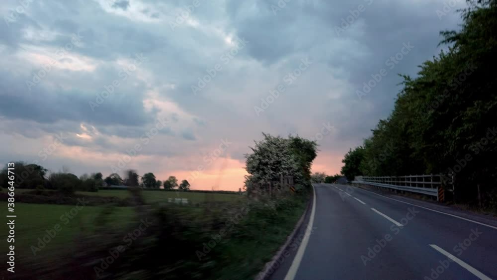 UK POV cycling driving storm cloud and sunset UK POV cycling driving storm cloud and sunset