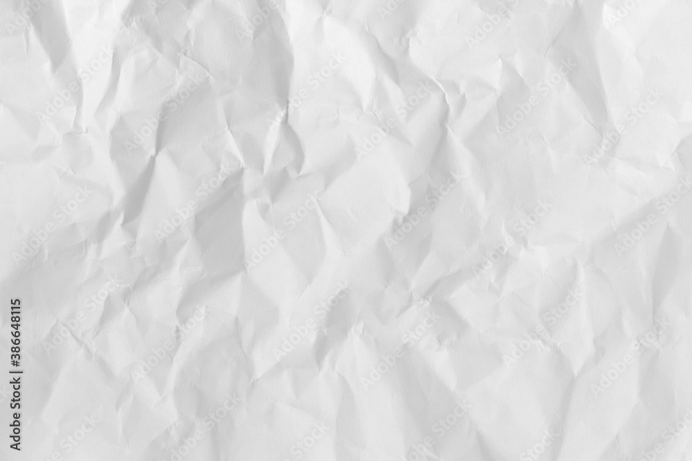 Obraz premium White crumpled paper texture background for design art work.