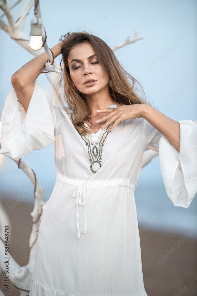 Fototapeta premium beautiful woman in white dress