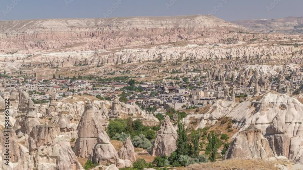 Red Valley and Rose Valley of Goreme of Nevsehir in Cappadocia aerial timelapse, Turkey. Love valley and fairy chimneys panoramic view with historic buildings Red Valley and Rose Valley of Goreme of Nevsehir in Cappadocia aerial timelapse, Turkey. Love valley and fairy chimneys panoramic view with historic buildings