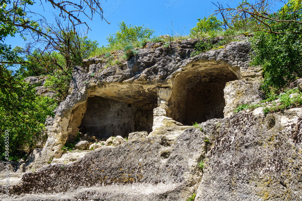 Ancient cave 'houses' in medieval city-fortress Chufut-Kale, Bakhchisaray, Crimea. These kind of 'buildings' were used for living, storage or even public places