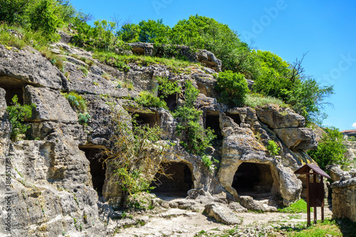 Residential caves inside ancient city Chufut Kale, Bakhchisaray, Crimea. These artificial 'buildings' used by ancients for living, food storage, animal sheds, & many other purposes