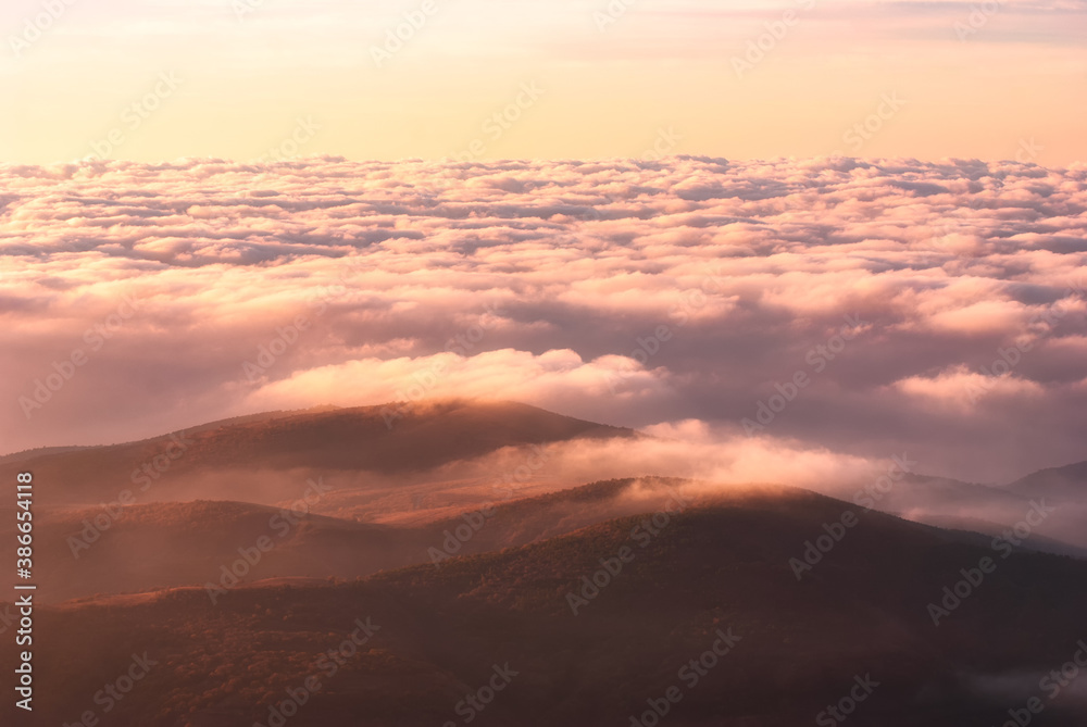 Majestic red clouds over the Crimea mountain valley Majestic red clouds over the Crimea mountain valley