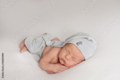 portrait of a little infant newborn baby: baby's face close-up. concept of childhood, healthcare, IVF

