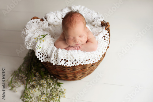 portrait of a little infant newborn baby: baby's face close-up. concept of childhood, healthcare, IVF
