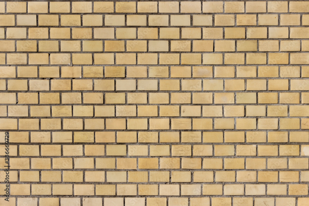 Surface of a yellow brick wall. Surface of a yellow brick wall.