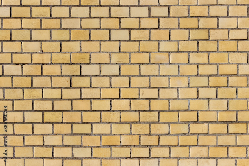 Surface of a yellow brick wall. Surface of a yellow brick wall.