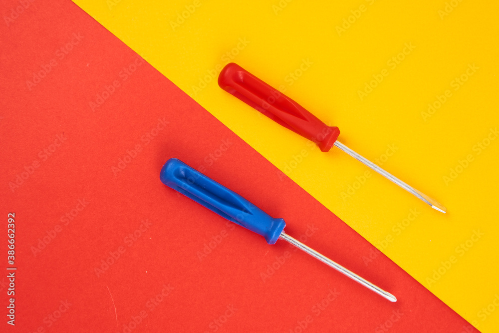 Fototapeta premium construction tools screwdrivers on double background repair equipment industry