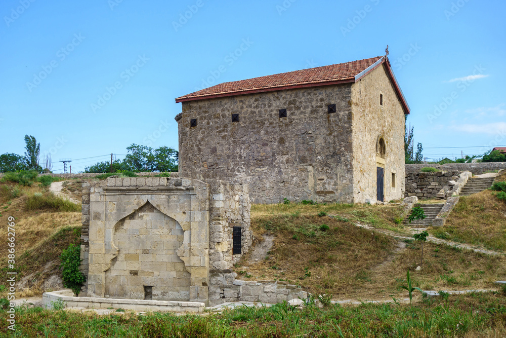Medieval monuments inside Genoese fortress, Feodosia, Crimea. Armenian fountain & Church of St Demetrious of Thessaloniki, both were built in XIV century