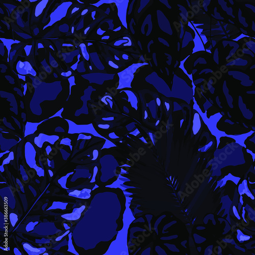 Tropical seamless pattern on animalistic texture. Jungle exotic summer print. Summer tropical leaf. Tropical flower fashion pattern. Floral tropic illustration. Vector seamless pattern.