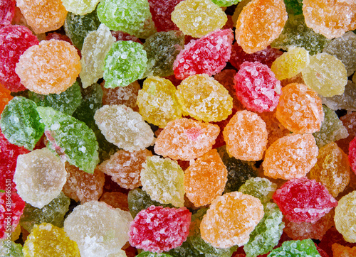 Background consisting of their small multicolored sweets. colorful delicious candy. photo