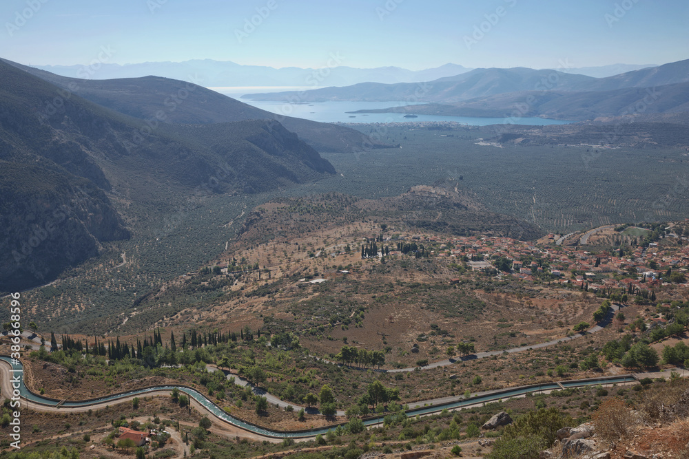 Archaelogical site of Delphi, Greece. Delphi is ancient sanctuary that grew rich as seat of oracle that was consulted on important decisions throughout ancient classical world. UNESCO World heritage