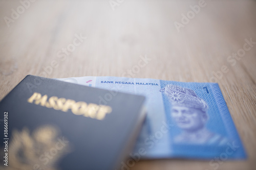 Malaysian National Bank on a One Ringgit Note Inside an American Passport