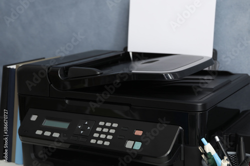 Closeup view of new modern black printer