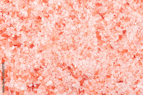 Himalayan pink salt background. Himalayan pink salt in crystals.