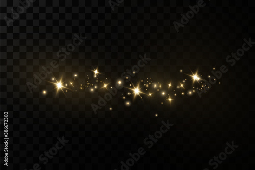 Glow light effect. Vector sparkles on a transparent background. Christmas light effect. Sparkling magical dust particles.The dust sparks and golden stars shine with special light.