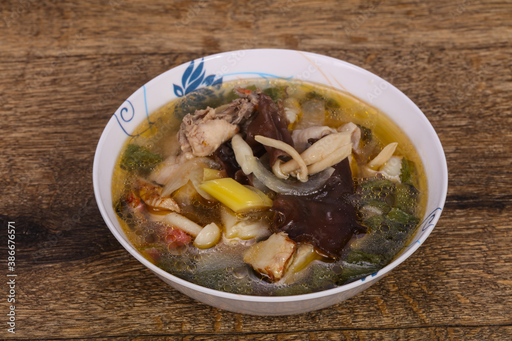 Thai style soup with meat and mushrooms Thai style soup with meat and mushrooms