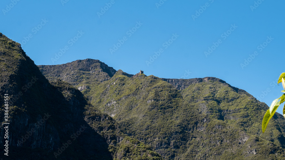 Fototapeta premium Panoramic view over the valley and the forests